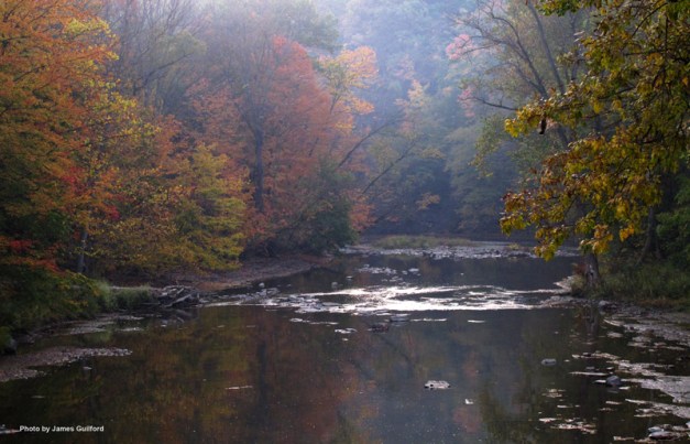 Photo: Morning fog burning off in an autumn river scene. Photo by James Guilford.