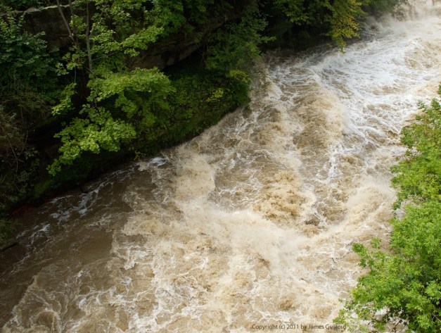 Photo: Rain-swollen mill stream in Garrettsville, Ohio. Photo by James Guilford.