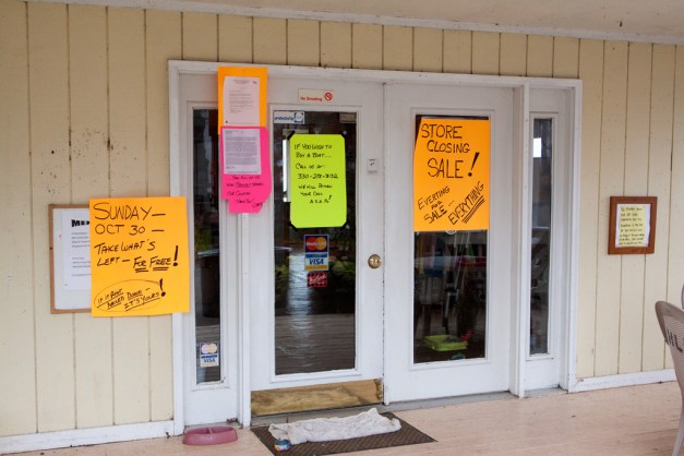 Boathouse Doors #4220 Photo: Closing signs on the entrance to the Hinckley Lake Boathouse. Photo by James Guilford.