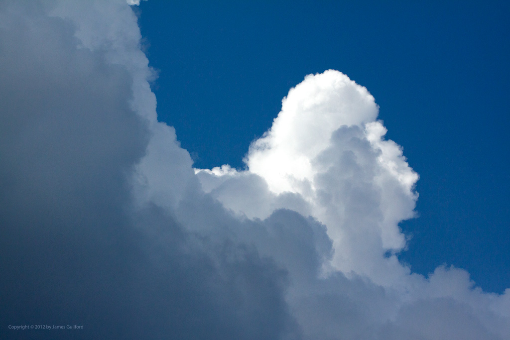 Photo: Cumulus clouds towering on a summer day. Photo by James Guilford.