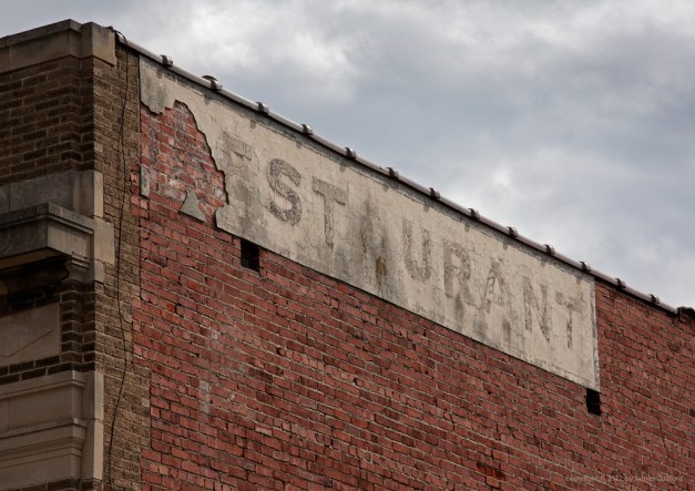 Photo: Deteriorating restaurant sign, missing first letter. Photo by James Guilford.