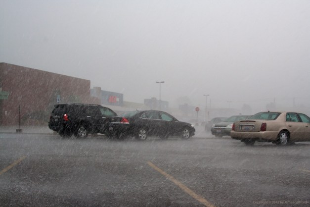Photo: Wind-driven rain in a parking lot. Photo by James Guilford.
