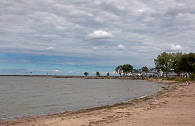 Photo: Curve of the beach at Vermilion, Ohio. Photo by James Guilford.