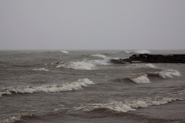 Waves crash ashore on the day of winter solstice. Photo by James Guilford.
