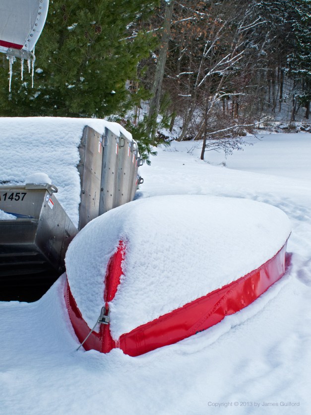 Photo: Boats covered with snow and ice. Photo by James Guilford.