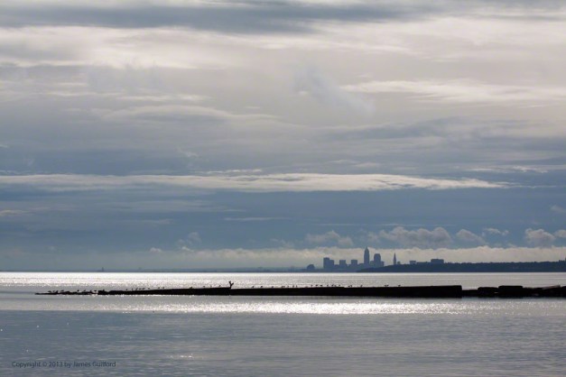 Photo: Sunlit clouds over Cleveland. Photo by James Guilford.