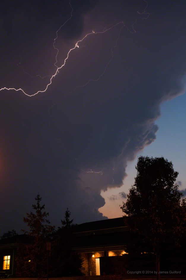 Photo: A lightning-filled thunderstorm arrives overhead. Photo by James Guilford.