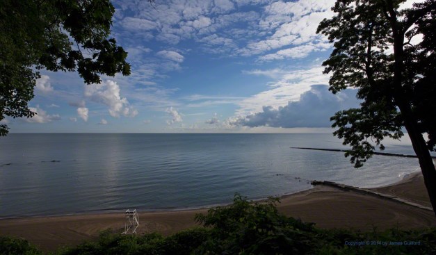 Photo: The day begins at Huntington Beach with freshly-groomed sands under a beautiful sky. Photo by James Guilford.