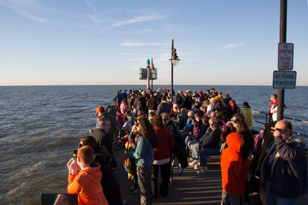 Photo: Crowd of people watching solar eclipse. Photo by James Guilford.