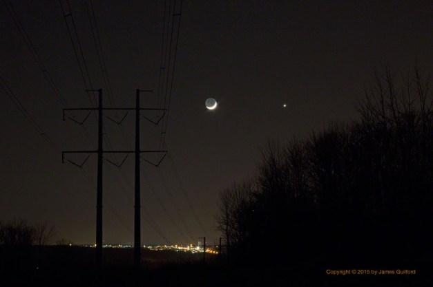 Photo: Moon and Venus in conjunction over city lights. Photo by James Guilford.