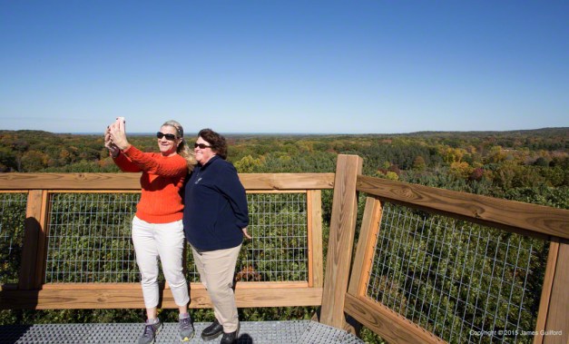 Photo: Two women take photo of themselves at the top of the tower. Photo by James Guilford.