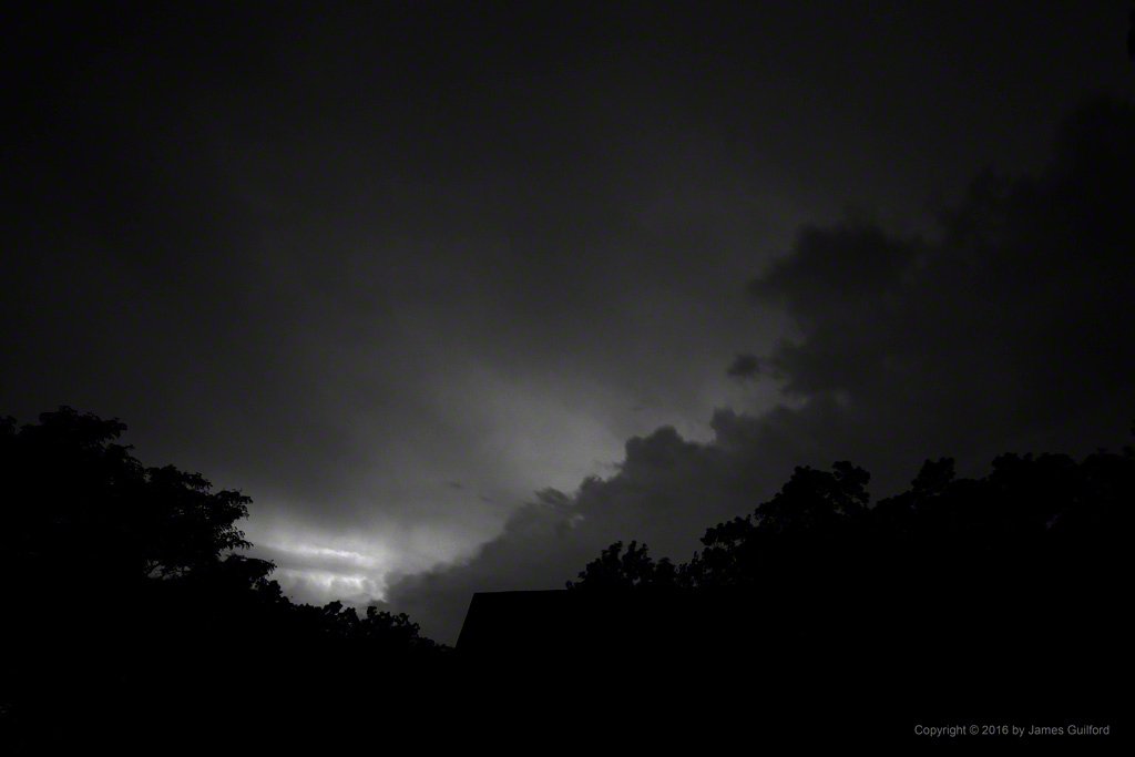 Photo: Lighting up the Distant Clouds. Photo by James Guilford.