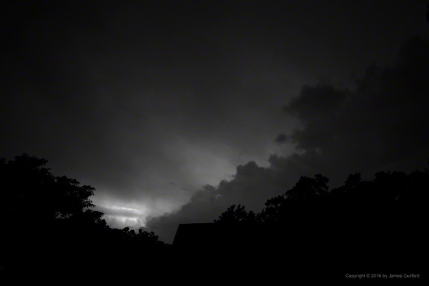 Photo: Lighting up the Distant Clouds. Photo by James Guilford.