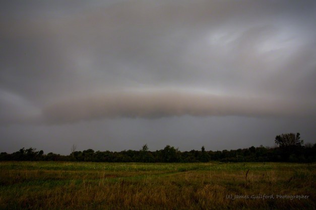 An arc of cloud ushers in cooler air and torrential rain.  August 19, 2017. Photo by James Guilford.