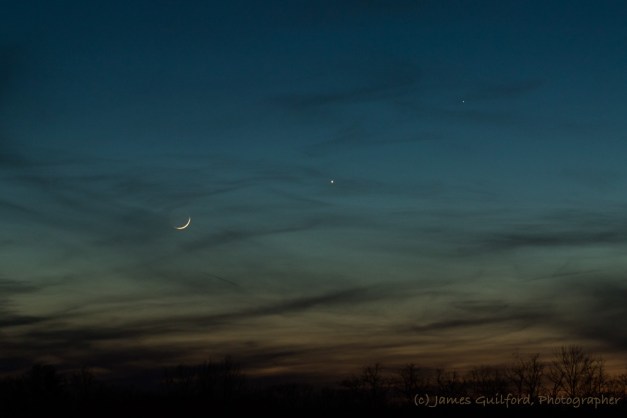 Photo: Blue Conjunction. The setting Moon and planets float in skies that changed in color before finally fading to night. Photo by James Guilford.