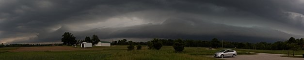 Photo: Approaching roll cloud/shelf spanned many miles across the western horizon as it ushered in heavy rain and some thunder. Photo by James Guilford.