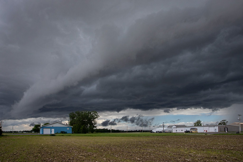 Photo: A gust front rushes closer ushering in a cold air mass and heavy rain. Photo by James Guilford.