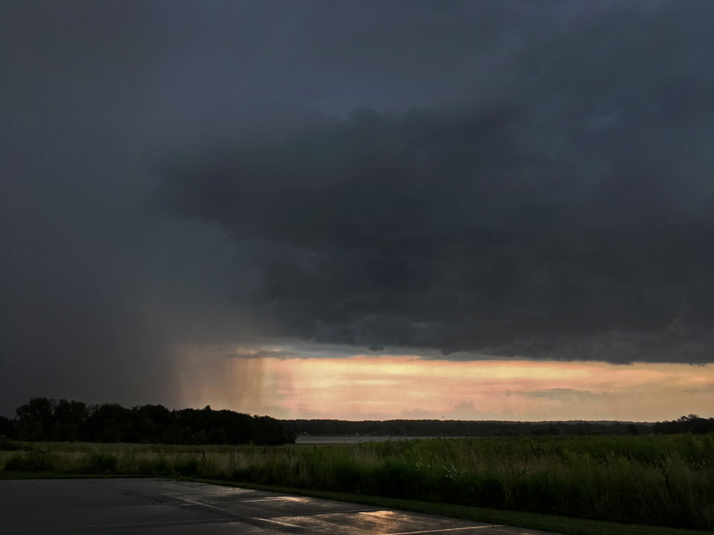 Photo: Dark clouds, rain curtains, diminishing light.
