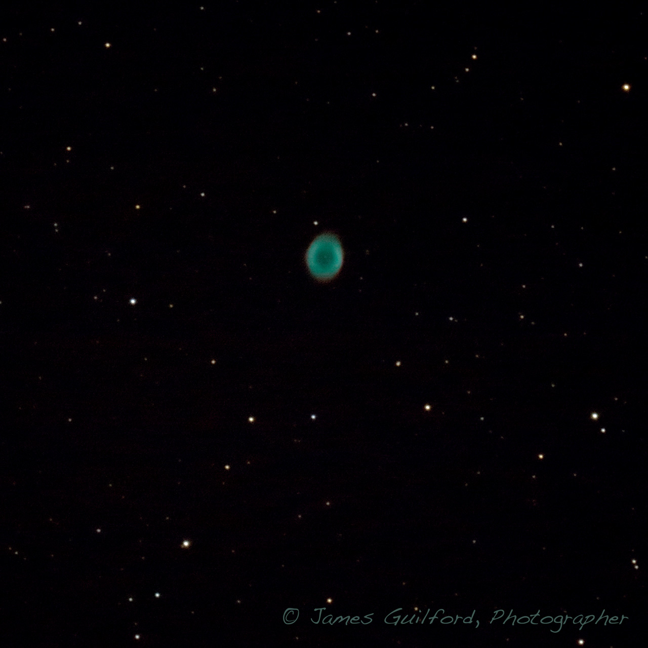 Photo: The Ring Nebula (M57) in Lyra. Photo by James Guilford.
