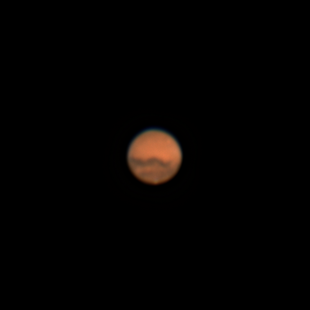 Photo: Mars during its opposition, or close approach to Earth, October 16, 2020. A tiny bright dot at the bottom is the planet's polar ice cap.